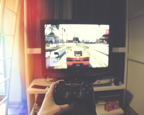 Classic retro gaming console displayed as a museum piece