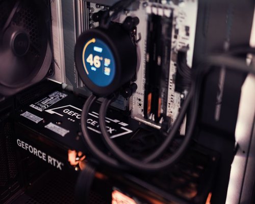 Modern PC gaming rig and curved display setup showing advanced graphics