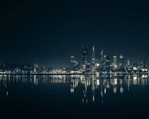 Perth city skyline and Swan River reflecting the bright Australian sky